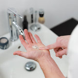 Man with a small amount of pomade on his palm